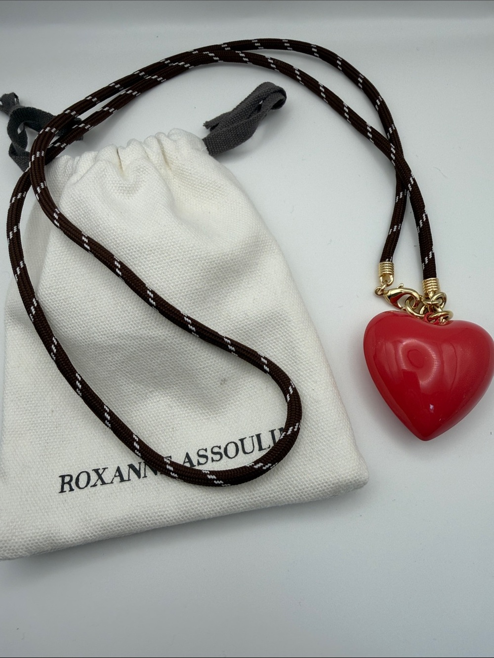 Roxanne Assoulin Rose Heart Pendant on Braided Brown Cord